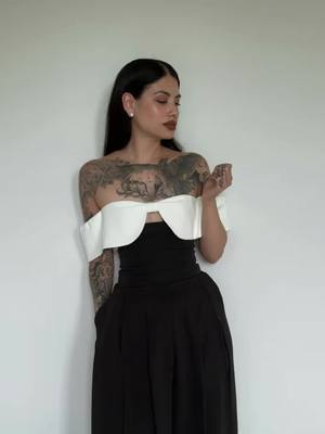 A post by @cejachel on TikTok caption: Just got this back from the tailors and had to put an outfit together asap! Off the shoulder tops will forever be a favorite of mine 🖤 #springfashion #grwm #outfitideas #romanticgoth #fashiontiktok #grwm #minimaliststyle #whatiwore #ootdinspo 