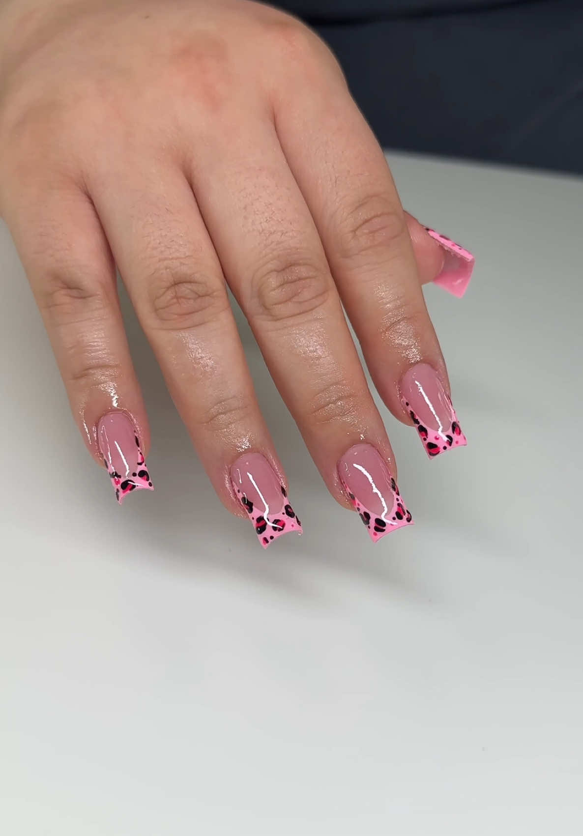 A post by @thanailldoll on TikTok caption: 🐆💗- Book your next appointment with me 😌 Discounts for the girls 🥹🎀 @Lé Moné Thenailldoll  @Ana Does Nailz Linda10 #nailsoftiktok #pinknails #cheetahprint #fypシ゚viral #longnails #galvestonnailtech #squarenails #galvestonnailtech #foryoupage #viralvideo 