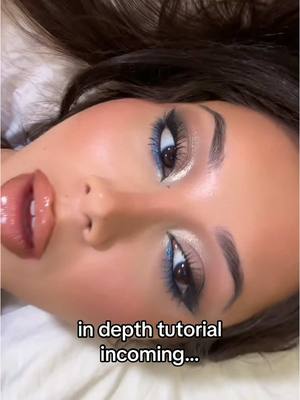 A post by @nazliayunus on TikTok caption: makeup tutorial using my fave @maccosmetics launches 🤎﻿ #MACStudioFix #MACAmbassador #Ad #makeup #makeuptutorial #makeuplook #blueeyeshadow #festivalmakeup #concertmakeup #glittereyeshadow #eyeshadowlook #eyeshadow 