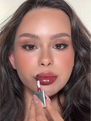 A post by @hayleybuix on TikTok caption: Team lipstick or Lipoil ? @Clinique #makeup #lipoil #lipstick #blackhoney 