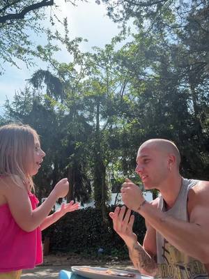 A post by @bobbypombo on TikTok caption: she’s an animal at rock paper scissor #uncle #bestie #toddlersoftiktok 