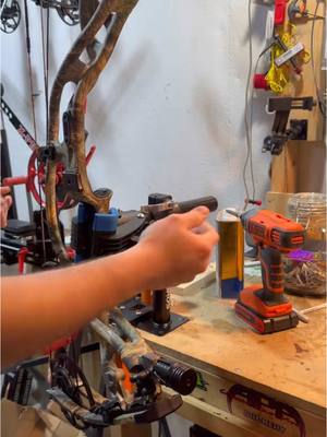 A post by @bowhunterplanet on TikTok caption: From bike holder to Bow Holder under $40 #archery 