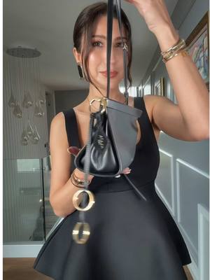 A post by @goozdeyle on TikTok caption: Akşam yemeğine hazırlanalım 🖤 #springoutfits reklam