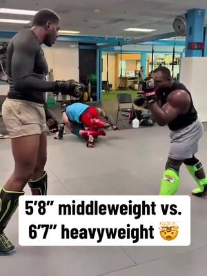 A post by @espnmma on TikTok caption: The size difference 😳 #ufc #mma #sparring #wow #heavyweight (via @punishertorrez)