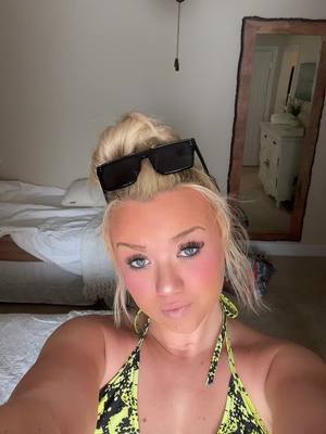 A post by @blondeandabaddie on TikTok caption: Pool day 💋