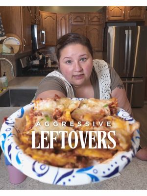 A post by @applesauceandadhd on TikTok caption: I have approximately 900 containers of leftovers, my husband “isn’t hungry,” the kids want cereal, and I’m over here eating lazy lasagna I did not film myself making because life is chaos and guilt is free apparently. Anyway—please distract me by weighing in on this outfit: cute, or full hobbit-core? Be honest but not too honest #LeftoversLife #LazyLasagna #MomGuilt #WhatsForDinner #IDidMyBest #NotAnOutfitInspoPage #HobbitVibes #IsThisCuteIDontKnow #ChaosDinner #RealLifeEats #CerealWinsAgain #DinnerWithDrama