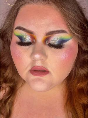 A post by @woootyyyy on TikTok caption: I just adore a colorful makeup look🌈✨ #makeupinspo #wootysbeauties #makeup #mua #fyp #MakeUpArtist #makeuptransition #muafyp 