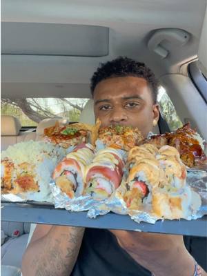 A post by @shawnfoodreviews7 on TikTok caption: Roll after roll like it owed me money 🍣 #sushi #sushilover #sushiroll #eating #Foodie #asmr #mukbangeatingshow #mukbang #fypシ゚viral 