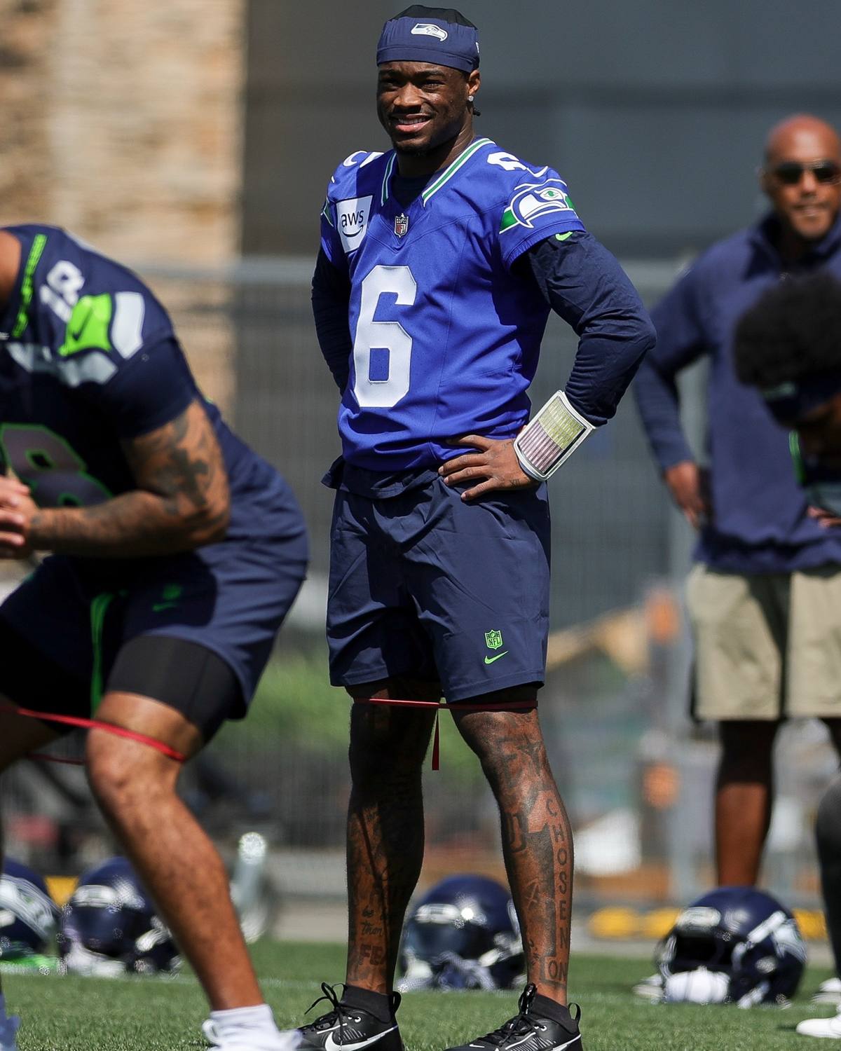 A post by @nfl on TikTok caption: time to put in the work 😤 #jalenmilroe #seattle #seahawks #nfl 