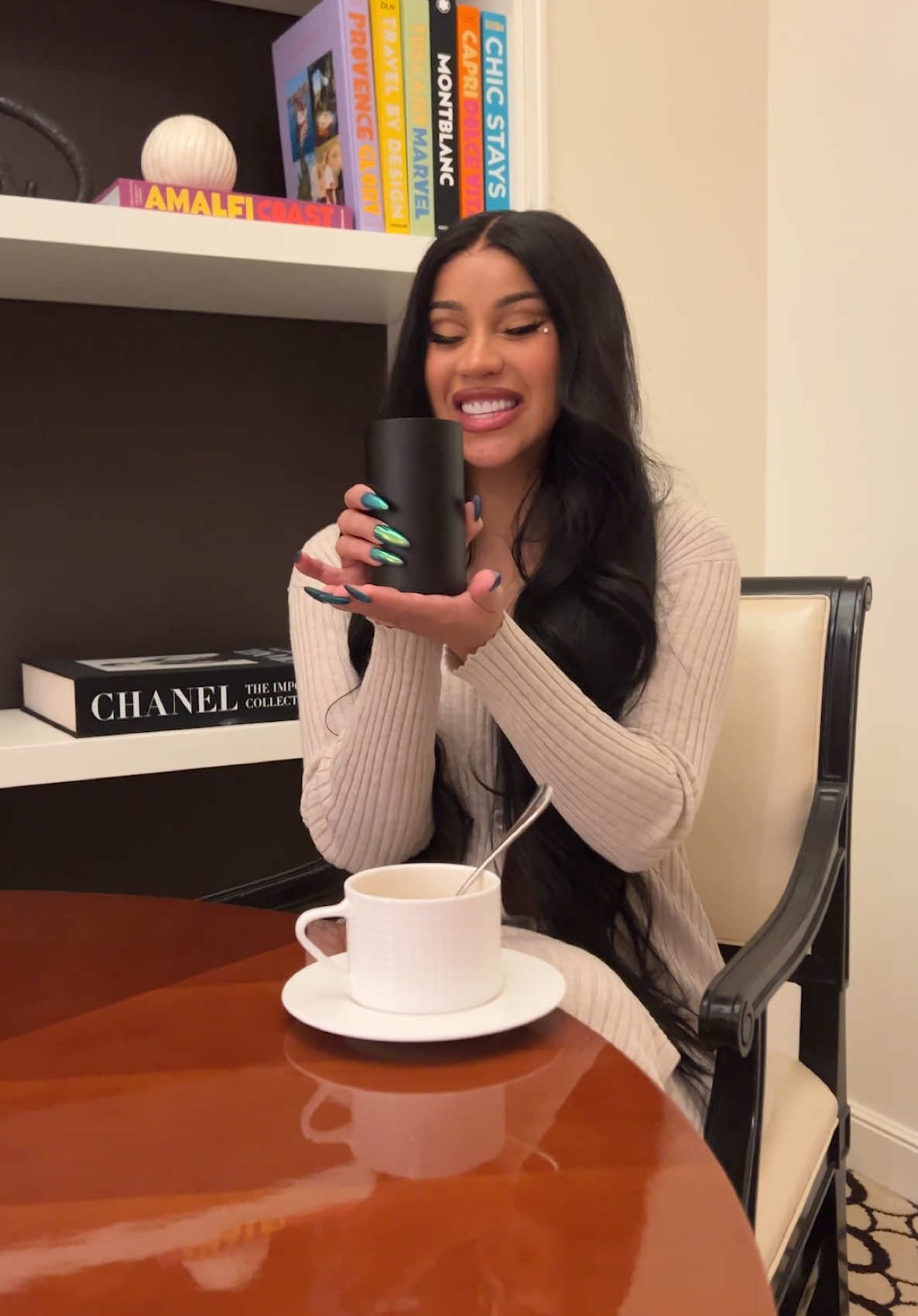 A post by @iamcardib on TikTok caption: Mom deserves best 💖 @Scentiment 