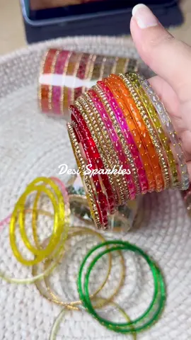 A post by @desi.sparkles on TikTok caption: Kina de Rashmi churi… because every Desi girl deserves a little sparkle! Our glass bangles are here to steal hearts—add that perfect jingle to your festive fit!