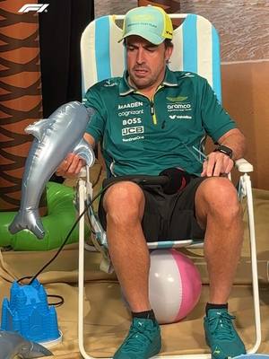 A post by @f1 on TikTok caption: wait why do @Fernando Alonso and the dolphin have beef 🤣 #F1 #formula1 #miamigp #fernandoalonso  