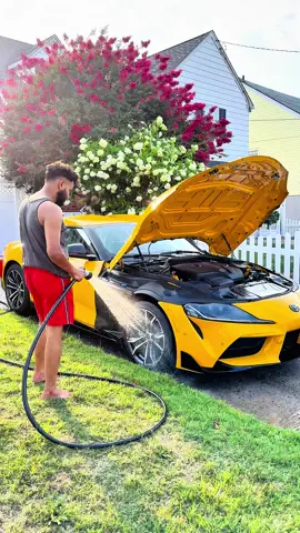 A post by @gazirifat30 on TikTok caption: washes my car in summer vibes in front of home  #newyork #unitedstates #enjoylife #washes #cleaning #supra #mk5 #summervibes 