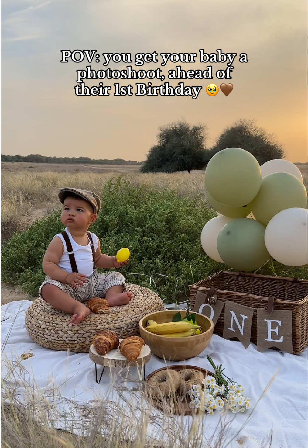 A post by @lisafiitt on TikTok caption: His little outfit 🤭 Our beautiful baby boy is 1 !!! 🤎  #photoshoot #firstbirthday #family 
