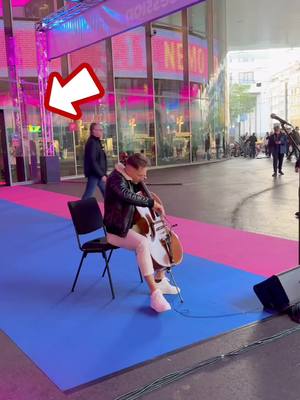 A post by @jodokcello on TikTok caption: Wait for it 🔥 I was playing the cello in town when the famous singer Teddy Swims suddenly came by and asked if I would play his song "The Door" with him. It was an incredible moment. #street #music #viral #streetmusic #teddyswims #coversong