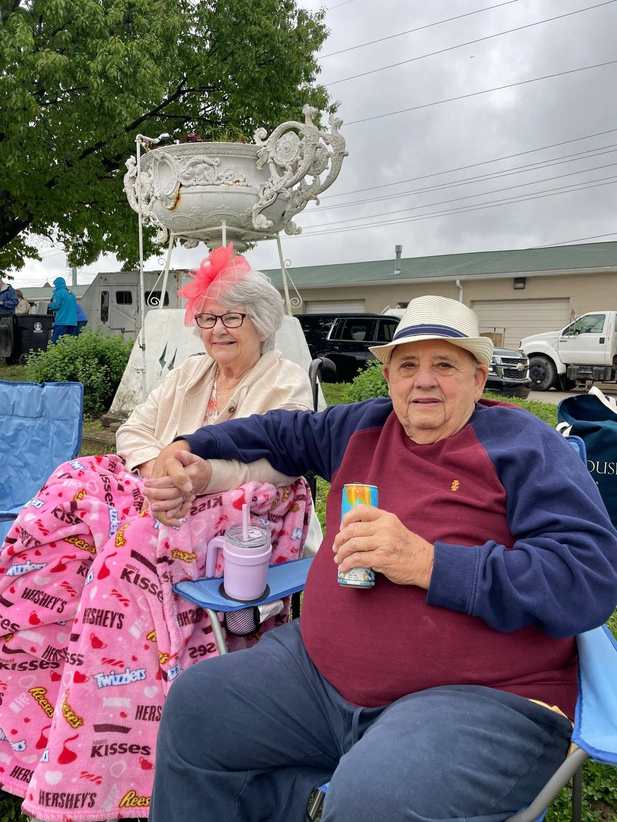 A post by @thejockandbelleshow on TikTok caption: Photo recap of the best experience 🐎🥹 Gram was given one of Sovereignty’s winning roses 😭🌹 #grandparents #family #roadtrip #kentuckyderby #happy #memory 