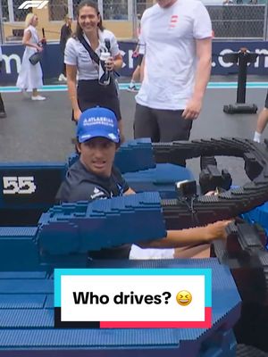 A post by @f1 on TikTok caption: Replying to @Little you just KNOW they all wanted a turn behind the wheel 🤣 @Alex Albon @carlossainz55 @Atlassian Williams Racing @LEGO #F1 #formula1 #miamigp  #landonorris 