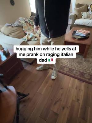 A post by @theragingitalian on TikTok caption: i juss wanted a hug 😭😂 #foryoupage #foryou #fyp #fypp #fy #viral #rage #funny #raging #italian #dad #fypage #theragingitalian #prank #fake #fakeaudio #fakebody #trending #trend #joke #hug 