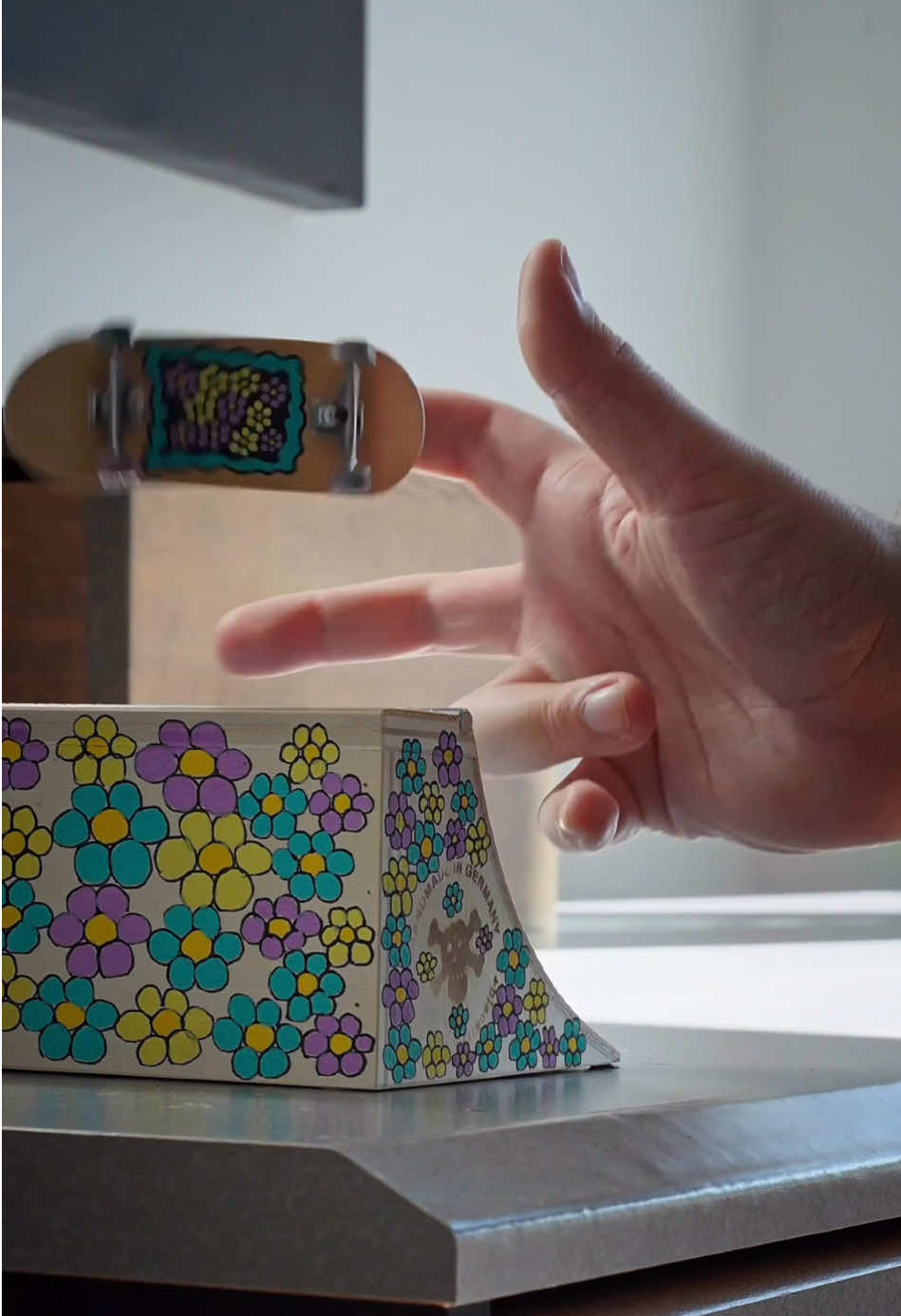 A post by @stonedboarder on TikTok caption: What’s your favorite qp trick? #fingerboard #fingerboards #fingerboarding #skateclips #fingerskate #skatelife #sk8 #techdeck #fingerboarder 