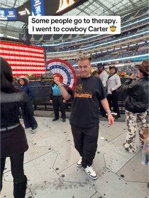 A post by @jeremystoomuch on TikTok caption: Front row babyyyyyy 🤠 Clock the studs in the background 👀 #cowboycarter #beyonce 