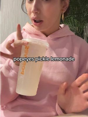 A post by @evaamarieee_ on TikTok caption: & we wonder y we all have mono LMAOOO ANYWAYS popeyes pickle lemonade 10/10 