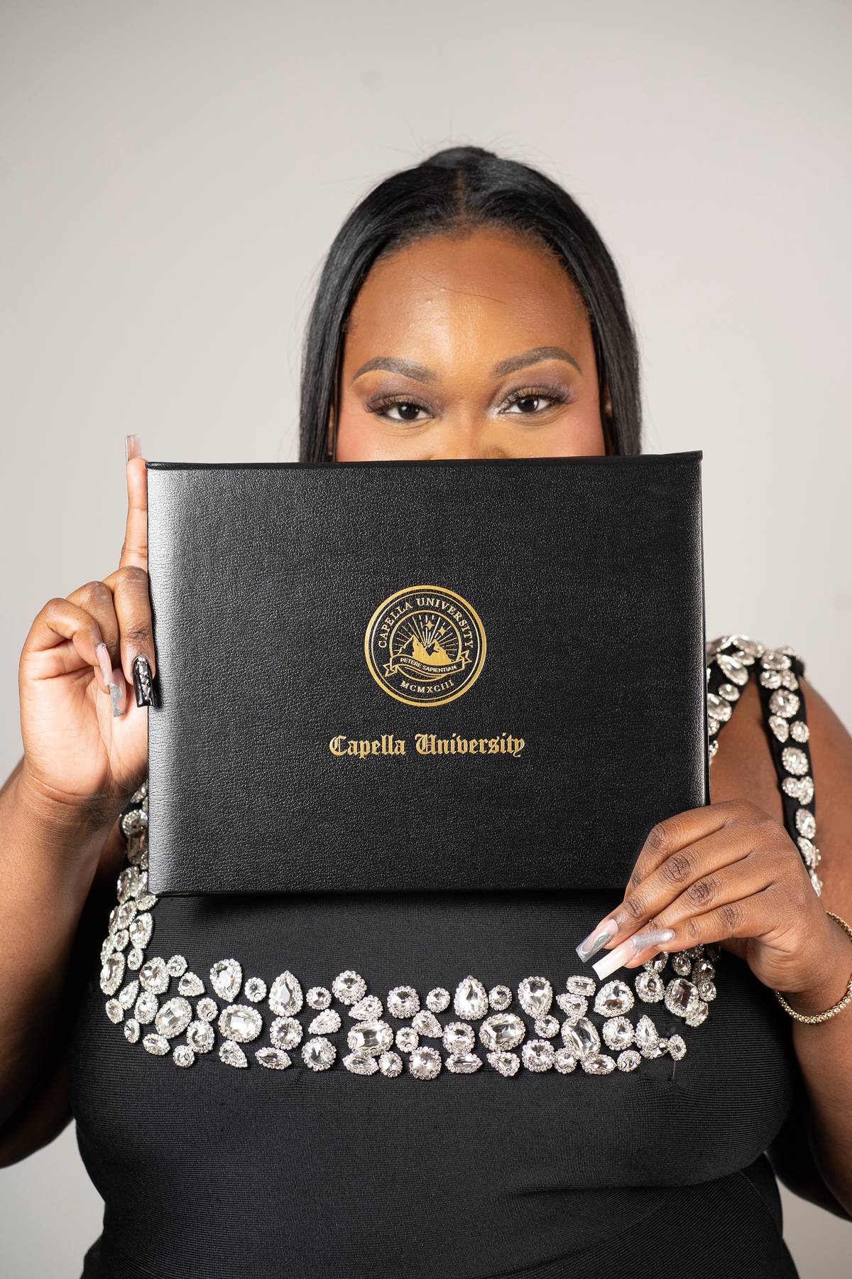 A post by @_perfectflaw_ on TikTok caption: *ignore the typo on the cap, it was too late to get it fixed* Whew! As a person who has helped over 8,000 clients obtain their degrees; I figured it was my turn again! I now have a Masters in Psychology. Here’s the kicker: I did it in a month. Capella’s flex plan allowed me to move at my own pace and for 36 days- I did just that. I secretly wrote 9-10 pages a day for those 36 days and managed to still keep a grasp on everything else in my life. This was just a small stepping stone towards my new goal; a doctorate!  While I had full access to my team, The Write Choice Docs: I did it all on my own. I wanted to really challenge myself and determine how long it would take me to finish the program. I mastered it in 36. 👏🏾