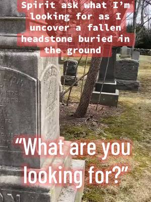 A post by @santaparanormal on TikTok caption: I uncovered a fallen headstone buried in the ground and a spirit asks what I am looking for #ghost #paranormal #spiritbox #cemetery 