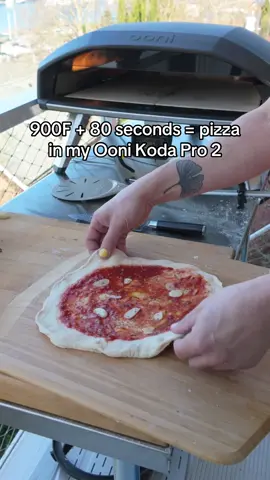 A post by @j.kenji.lopezalt on TikTok caption: Here’s a pizza bake from start to finish in my @Ooni Pizza Ovens Koda 2 Pro. This is the 7th or 8th Ooni I’ve owned (starting way back with the very first pellet-fired model), and it’s my favorite so far. It’s gas (I’m running mine on a regular LP tank), which I frankly prefer to wood, coal, or pellets for these backyard ovens. Easier start up and maintain heat, which means I’m more likely to use it often. It’s also adjustable on the fly so you can preheat really hot and drop the flame down low when the pizza goes in if you prefer a style with a crisper bottom crust and more even golden brown color, like New York or a neo-Neapolitan. When it comes to pizza, wood doesn’t make any discernible difference in flavor anyway. A proper wood fire should be mostly smoke-free and the pizza is not in there long enough to pick up any discernible smoke flavor. This oven is an upgrade from my previous fave pizza-focused oven, the Koda 16. At 18 inches it’s two inches wider, which gives plenty of room for maneuverability, larger pizzas, or dual personal pizzas. It has flame bars on both sides for more even heating, a glass heat shield so you can see the action, and a built-in ambient temp thermometer as well as a probe thermometer for keeping track of the temp of meat or other things you cook in it. I’m also a fan of the Karu series of ovens which are multi-fuel and have a taller ceiling so you can do things like roast a whole chicken or a tall loaf of bread. (IE the Koda is my choice for pizza fanatics and Karu for folks who want more versatility). #ooni  #sponsored  #ad 