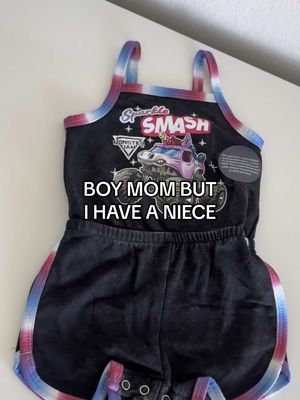 A post by @jassn26 on TikTok caption: She didn’t choose the monster jam life, the monster jam life chose her 😂🦄✨ I cannot WAIT to see this on her!!!! I literally screamed when I opened it! How cute is it!!! 😩 unfortunately it’s sold out online but I’ll update once I can share the link, also be on the lookout in stores! 🫶🏽 #monsterjam #walmartfinds #walmarthaul #sparklesmash #auntlife #momlife #boymomlife #monsterjamfans #walmartfashion 