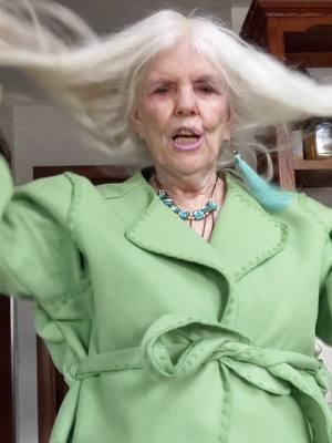 A post by @sassygrandmapat on TikTok caption: 💚 Green coat