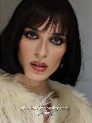 A post by @minazibayi on TikTok caption: Short hair with bangs >>>>>>>>🐈‍⬛🐈‍⬛🐈‍⬛🐈‍⬛🐈‍⬛🐈‍⬛🐈‍⬛