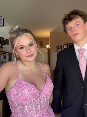 A post by @avaxlawrence on TikTok caption: pink bubblegum princess for prom #prom25 #prom #promcouples #promdress 