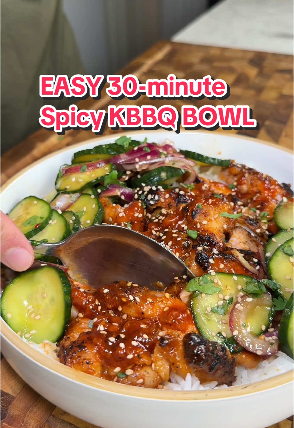 A post by @ice.karimcooks on TikTok caption: Easy 30-Minute Spicy Korean BBQ Chicken Bowl with a Marinated Cucumber Salad 😭🔥 Macros per serving with 1 cup rice per serving (x2 servings): approx 732 calories |43g P | 67g C | 33g F For the Chicken: 	•	16 oz chicken thighs, boneless skinless 	•	Salt & Pepper, to taste 🧂 	•	1 tsp garlic powder 🧄 	•	1 tbsp Cornstarch/flour (for coating) 	•	2 tsp Avocado oil 🥑 For the Sauce: 	•	1 tbsp butter 🧈 	•	2 tbsp gochujang 🌶️ 	•	1 tbsp honey 🍯 	•	3 cloves garlic, minced 🧄 	•	1/2 cup water (adjust as necessary) 	•	1 tsp sesame oil For the Korean Cucumber Salad: 	•	2 large cucumbers, thinly sliced 🥒 	•	1/2 red onion, thinly sliced 🧅 	•	1/4 cup rice vinegar 🍚 	•	1 tbsp sugar 🍚 	•	1 tbsp soy sauce 🍶 	•	1 tsp sesame oil 🌾 	•	1 tsp toasted sesame seeds 🌱 	•	1 clove garlic, minced 🧄 	•	1/4 tsp chili flakes 🌶️ (optional) 	•	Fresh cilantro, chopped 🌿 . . . . . #icekarim #healthyrecipes #easyrecipes #mealprep #quickrecipes 