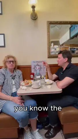 A post by @georgehahnnyc on TikTok caption: The George & Judy Show: ‘Pigs in a Blanket’ Edition  @jewdygold 