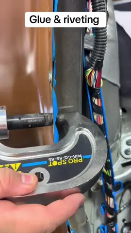 A post by @luxury.car.repair on TikTok caption: Flow form rivet going in on this Tesla quarter panel replacement…  • #luxurycarrepair #bodyshoplife #autobody #panelbeater #bodyshop #collision #collisioncenter #autobodyshop #repair #tesla #teslalife #teslaclub #teslamodel3 #teslamotorsclub 