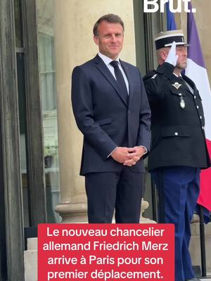 A post by @brutofficiel on TikTok caption: Le nouveau chancelier allemand Friedrich Merz arrive à Paris pour son premier déplacement. #friedrichmerz #paris #emmanuelmacron #macron 