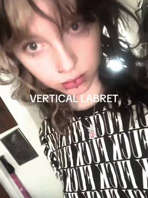 A post by @tokiioreo on TikTok caption: got it done literally an hour ago #piercing #verticallabret #06 