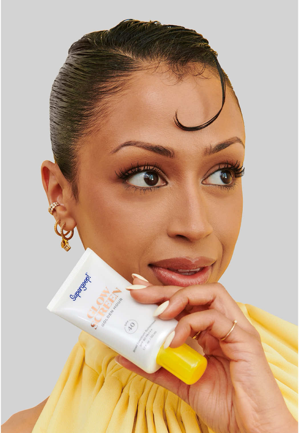 A post by @lizzza on TikTok caption: I’m retired… because you don’t need me to Feel Super, you just need @Supergoop! I’m out 😘 #supergooppartner 