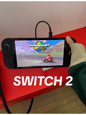 A post by @nintendo.grl on TikTok caption: Nintendo sent me out to Paris to try the Switch 2 in person!! 🥹 The display is so bright and colourful and Mario Kart World was AMAZING!! I genuinely cant wait for release day😭 // #switch2 #nintendoswitch {GIFTED}