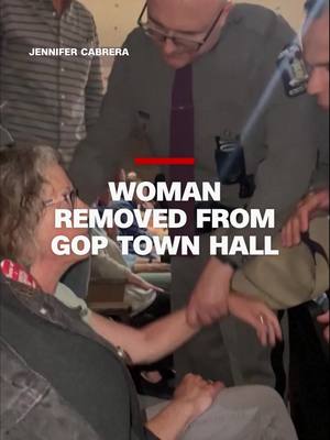 A post by @cnn on TikTok caption: State troopers physically removed Emily Feiner, a 64-year-old social worker, from a town hall hosted by New York Republican Rep. Mike Lawler. #cnn #news #townhall #gop