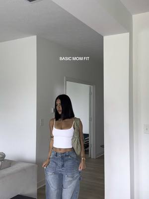 A post by @alyssiaaleavell on TikTok caption: a white tank hates to see me coming 😮‍💨| #ootd #whatiwore #basicoutfit #outfitinspo #whitetank #baggydenim #bobinspo #momoutfit #outfitinspo #simpleoutfit #flipflopoutfit #bottegaveneta #bottegajodie 