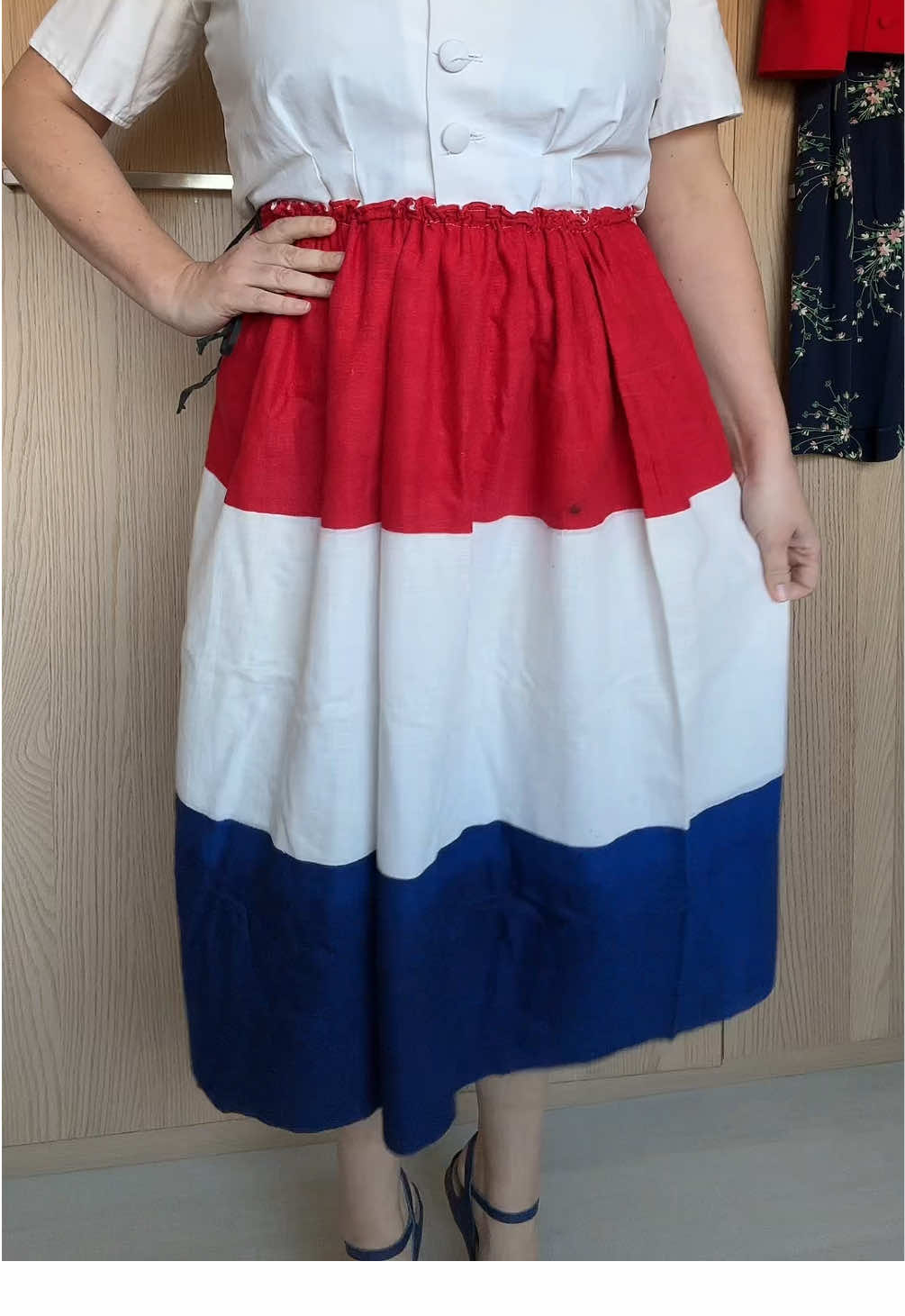 A post by @hollandschmeisje on TikTok caption: Happy 80th birthday to this skirt that was hastely made from a Dutch flag to celebrate the original VE Day 🇳🇱  #veday80thanniversary #veday80 #vforvictory 