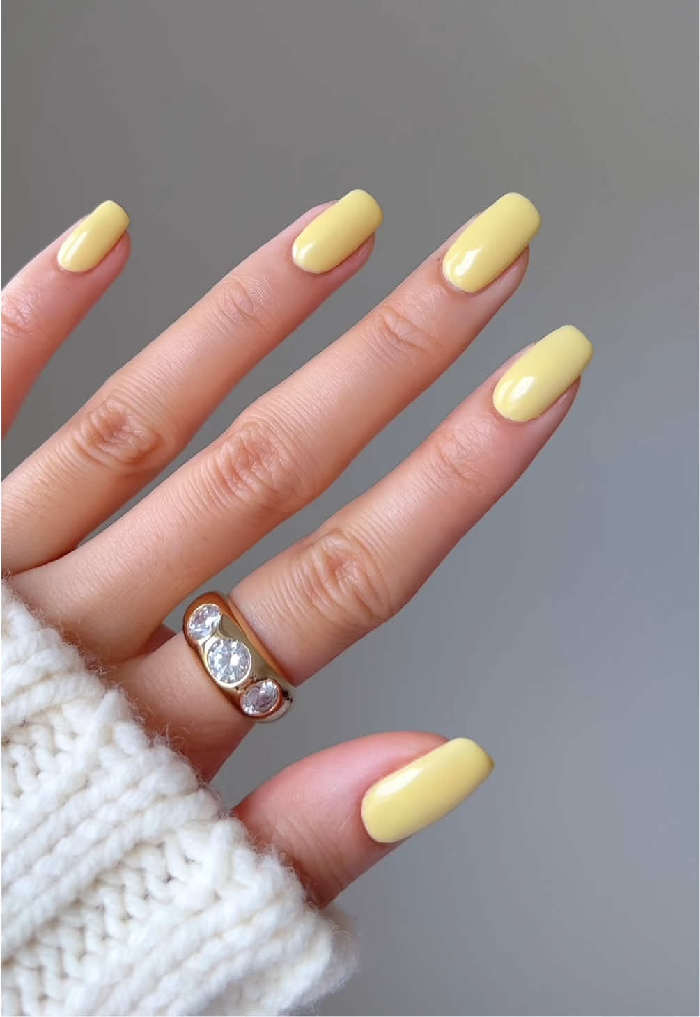 A post by @nailsbyalsn on TikTok caption: getting the viral Butter Yellow nails with @Sally Hansen Insta-Dri polishes!! 🌟 available at your local @Shoppers Drug Mart  Using shades: Do Not Comcute and Clearly Quick  #butteryellow #butteryellownails #nailinspo #springnails #pastelnails