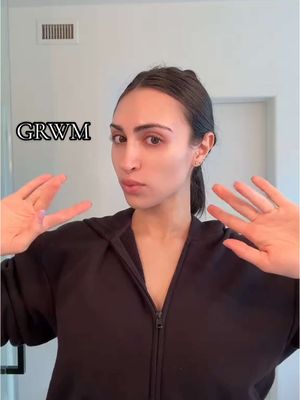 A post by @dariakateb on TikTok caption: GRWM 🤍 @Glossier serum @Westman-Atelier skin tint & blush @Rare Beauty bronzer @Kosas concealer, powder, brow gel, setting spray & lipstick @ILIA Beauty mascara @Grande Cosmetics lash lift @Beautyblender @NYX Professional Makeup lip pencil @Paula’s Choice lip balm #grwm #getreadywithme