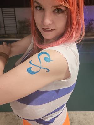 A post by @chimeracostumes on TikTok caption: Pirate cosplay season is almost here! Nami from One Piece is definitely going to be a favorite of mine this year #sewing #costume #Manga #anime #cosplay #diy #Nami 