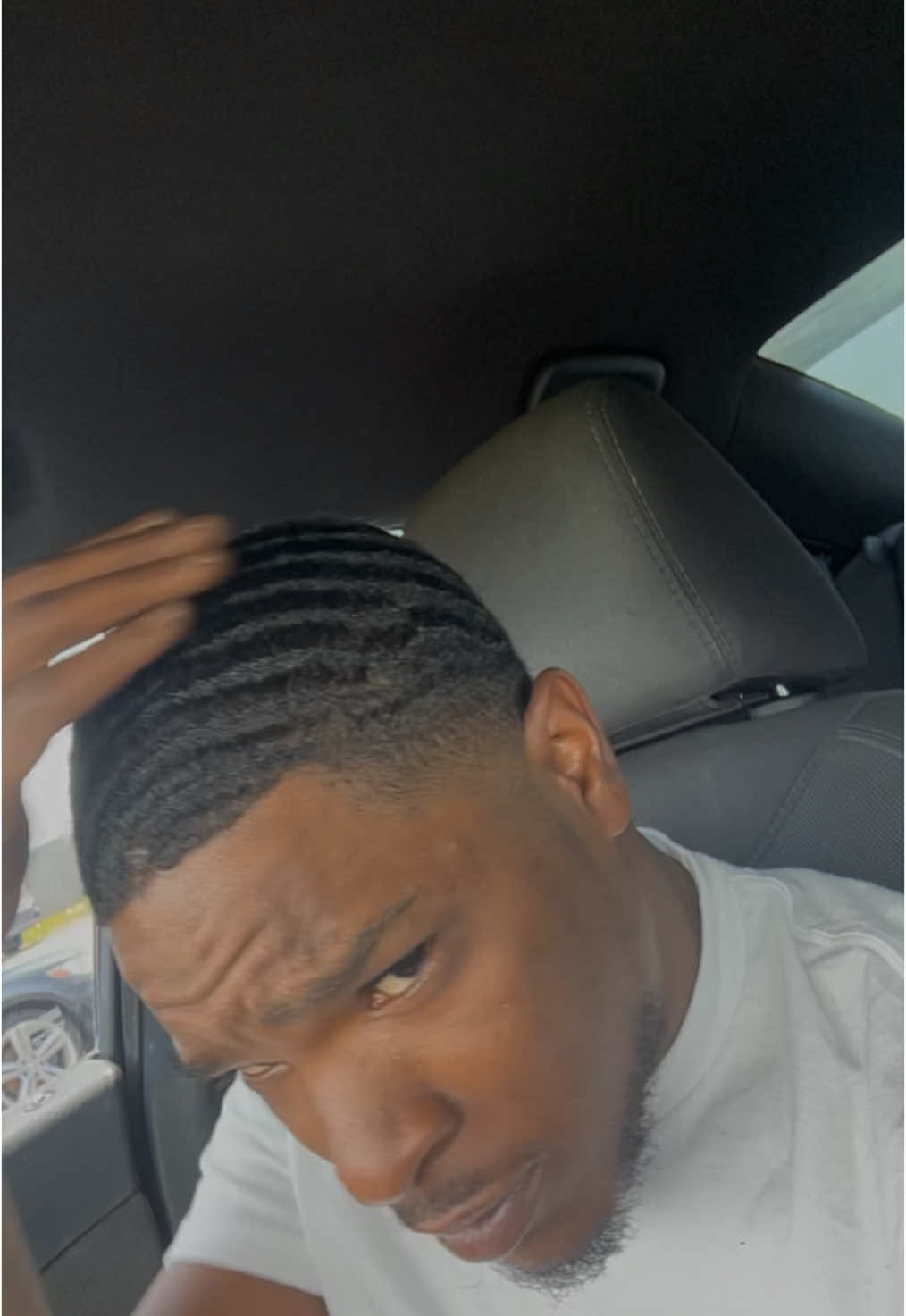 A post by @hardbodyalmighty on TikTok caption: Getting nice with the self Cuts…High Taper💪🏾 #fyp #hightaper #viral #selfcare 