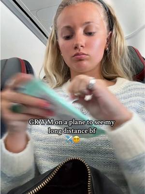 A post by @kambriella on TikTok caption: The guy next to me started to record me #grwm #makeup #plane #ldr 