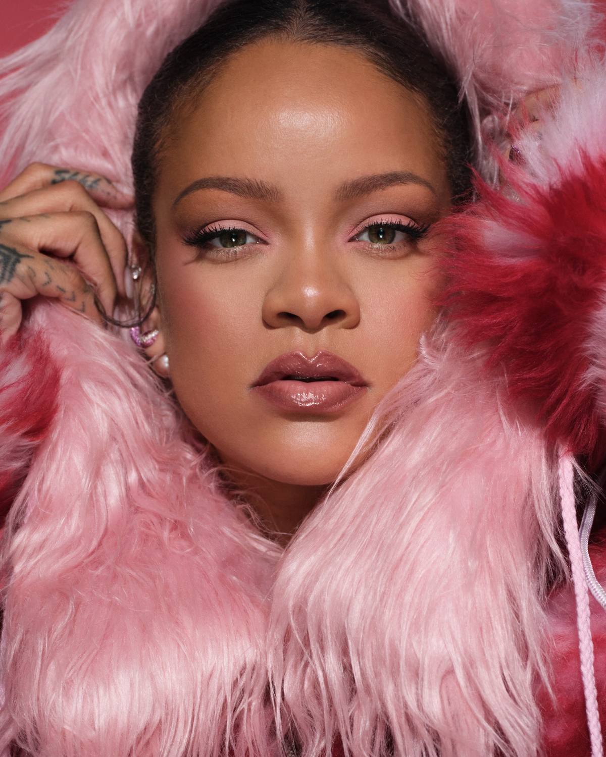A post by @fentybeauty on TikTok caption: T-minus 1 day got us feelin' fu$$y! 💗 Get pretty, pink, & fuzzy like @Rihanna at our Gloss Bomb Shop Pop-Up tomorrow in the heart of SoHo i Muva is wearing #GlossBomb in 'Fu$$y' + #TracedOut Lip Liner in 'Thugz Blush Too' 🩰🎀💕