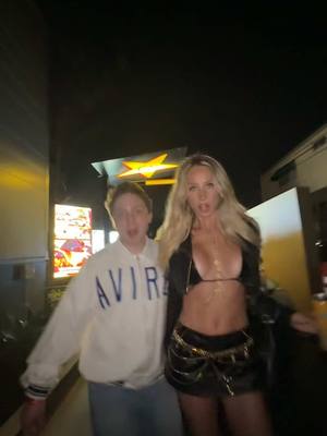 A post by @alixearle on TikTok caption: Struttin thru the drive thru @Jake Shane 