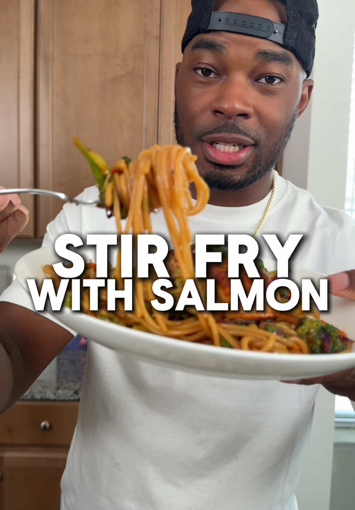A post by @onestopchop on TikTok caption: Bro how do yal be slurping food on the norm like that 😂. Anyways this Stir fry was the truth and I might need it like 2 times a week now lol #stirfry #salmon #30minutemeals #onestopchop 